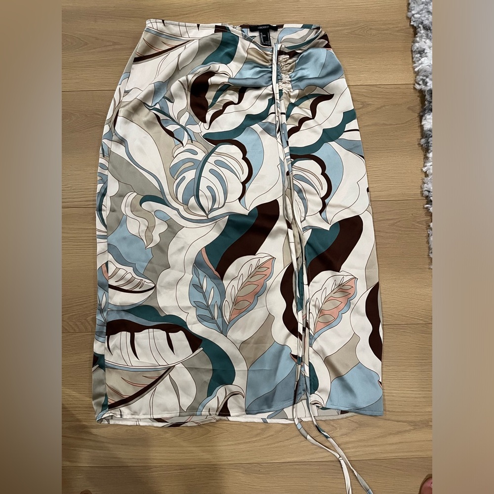 Forever 21 silk skirt, cream and multicolored, fits true to size.